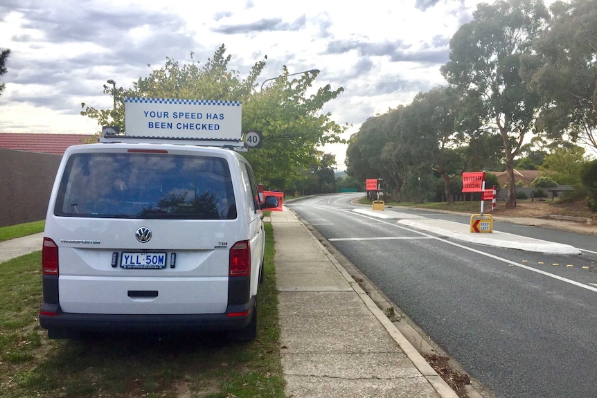 A mobile speed van in front of a crossing at a school in Canberra.