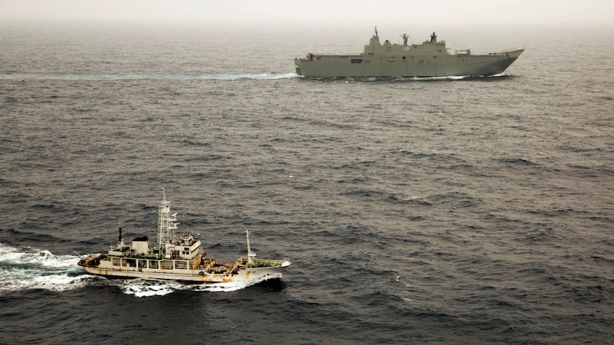 HMAS Adelaide shadows a suspected Chinese drug ship