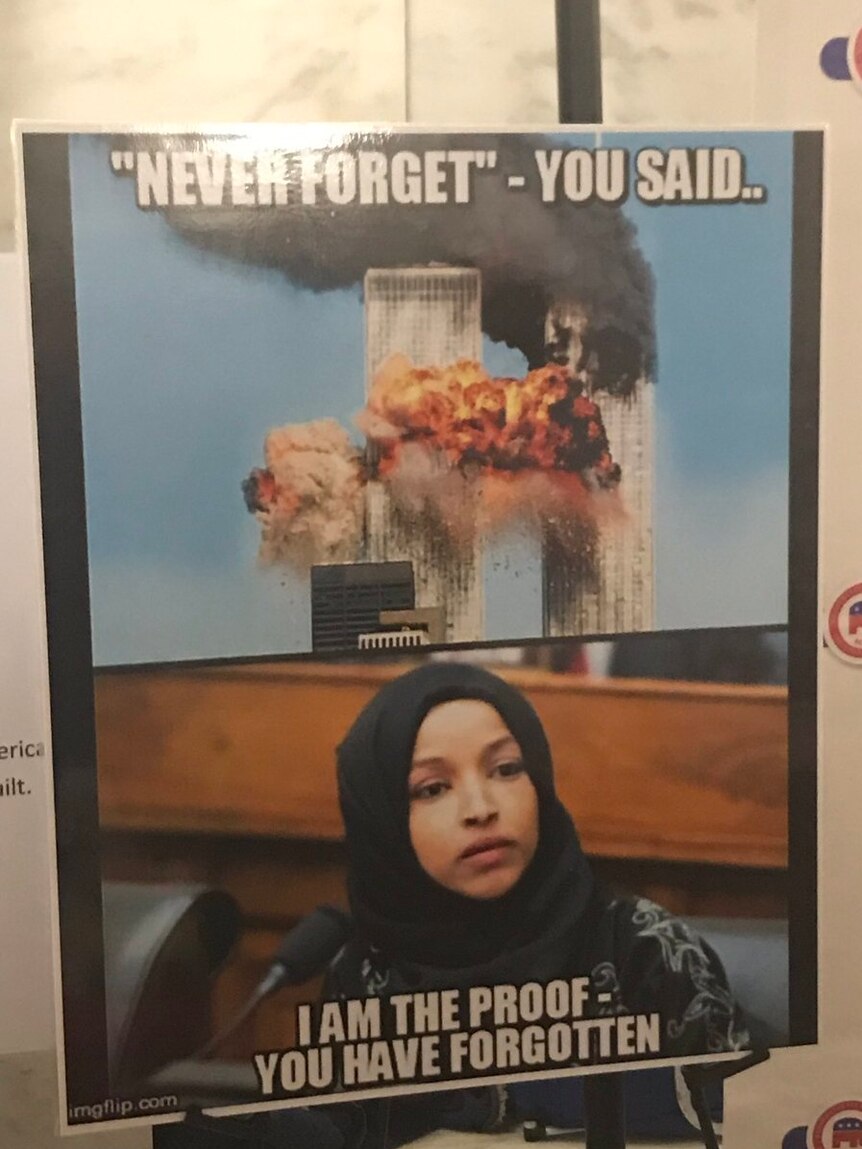 The poster was photographed hanging from a stall at the West Virginia Republican Day.