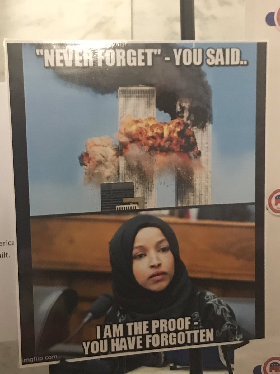 这张海报被拍到悬挂在西弗吉尼亚州共和党的一个摊位天。” class=
