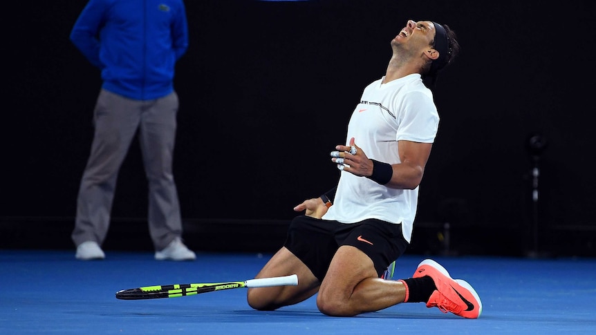 Rafael Nadal drops to his knees as he celebrates his win over Grigor Dimitrov in their semi-final.