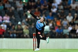 Female cricketer Amanda-Jade Wellington bowls a ball during an Adelaide Strikers WBBL match