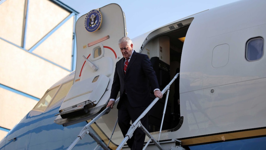 US Secretary of State Rex Tillerson steps off a plane in Mexico.
