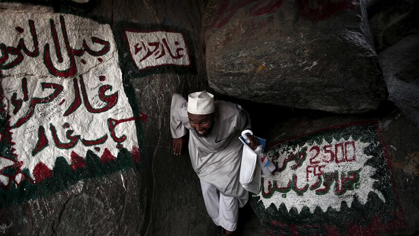 A Muslim pilgrim makes his way to Hera cave
