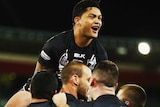 New Zealand celebrates a try in the Four Nations final against Australia