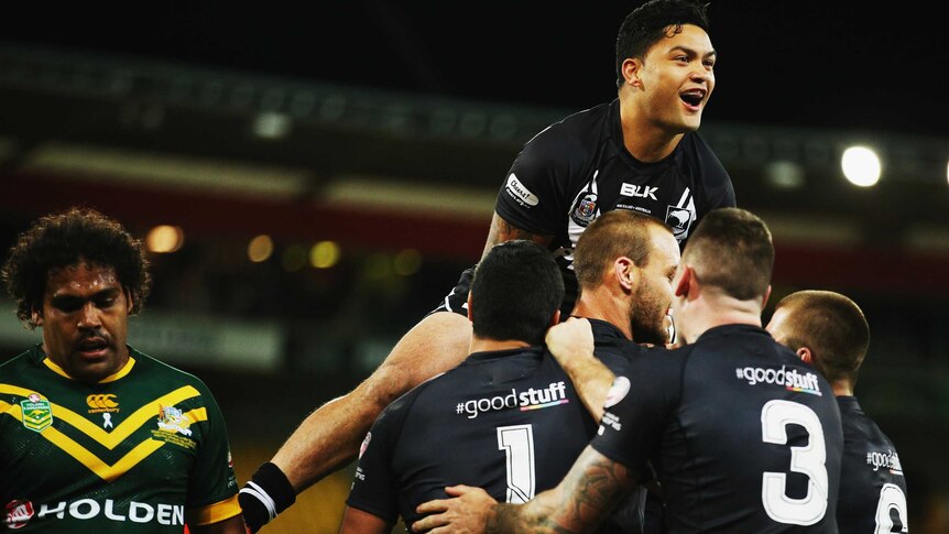 Isaac Luke and Manu Vatuvei of New Zealand celebrate a try in Four Nations final against Australia.