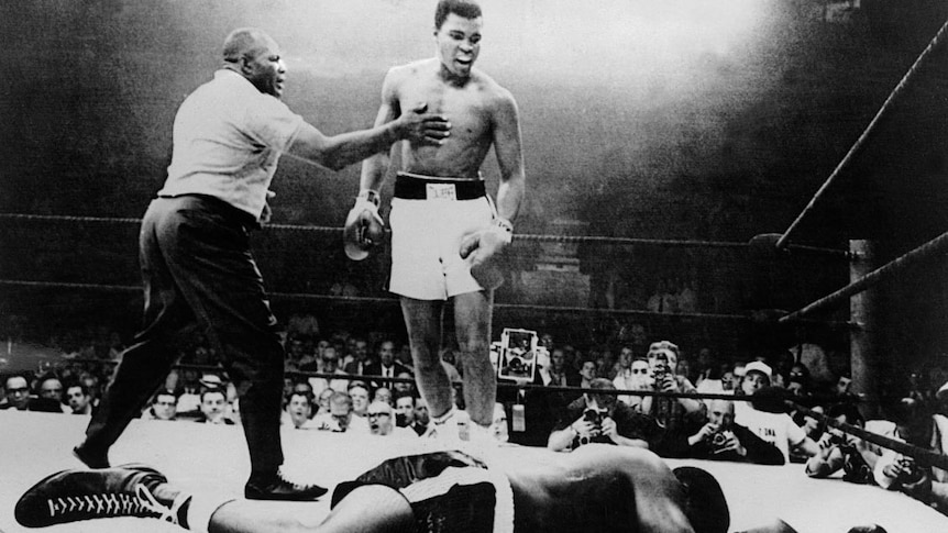 Muhammad Ali stands over Sonny Liston after knocking him out in May 1965.