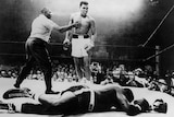 Muhammad Ali stands over Sonny Liston after knocking him out in May 1965.