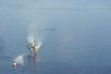 The oil slick is 14 kilometres long and 30 metres wide, and is about 100 kilometres off the Western Australian coast.