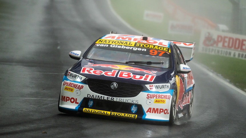 Shane van Gisbergen in his Holden in the rain