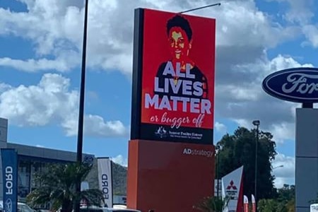 Sign with picture of Pauline Hanson with text "all lives matter or bugger off".