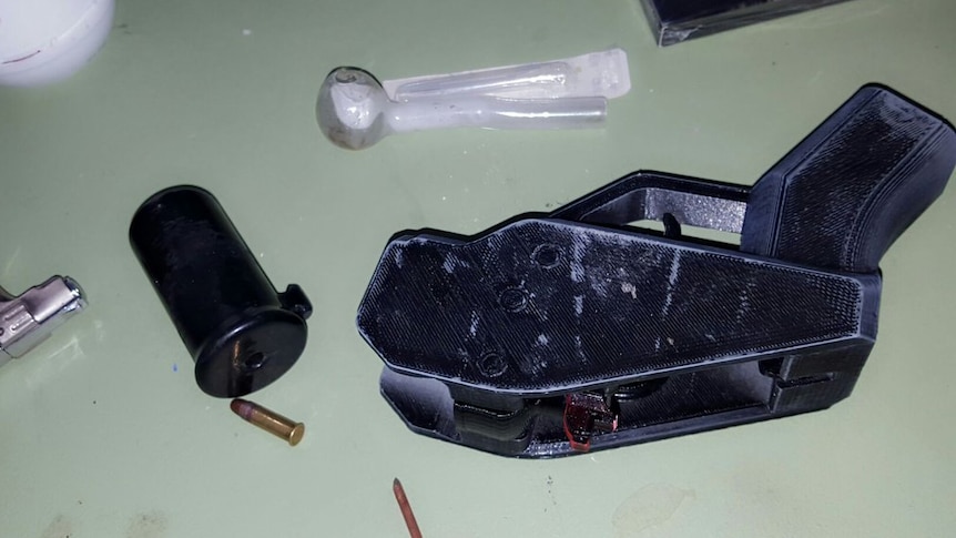 A loaded 3D-printed handgun found during a raid