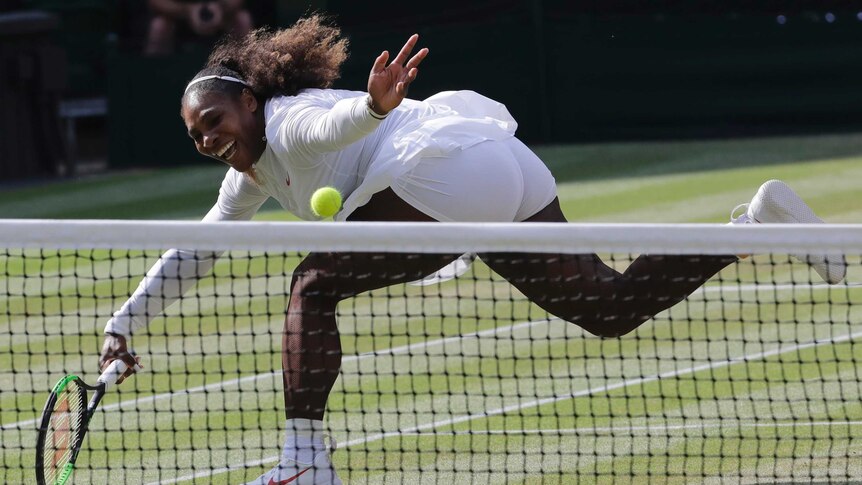 Serena Williams lunges for a ball to return in Wimbledon final