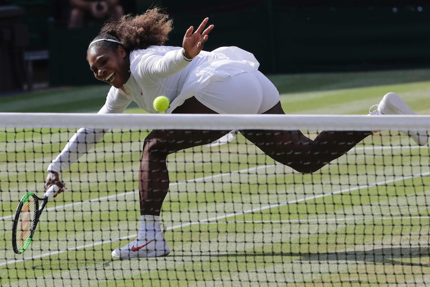 Serena Williams lunges for a ball to return in Wimbledon final