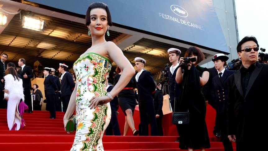 Fan Bing Bing poses on the red carpet at Cannes.
