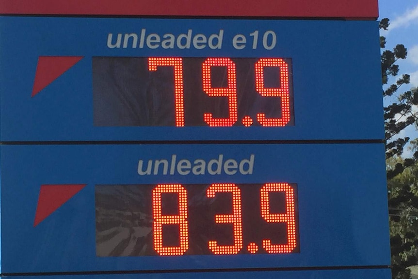 A sign outside a petrol station indicating the price of unleaded fuel.