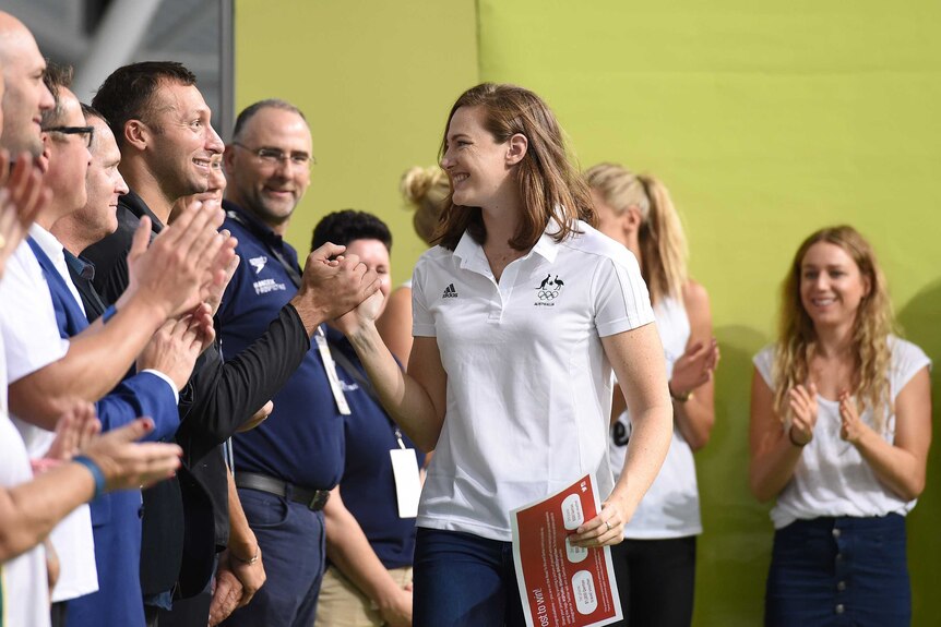 Cate Campbell is congratulated by Ian Thorpe after the Australian national swimming titles