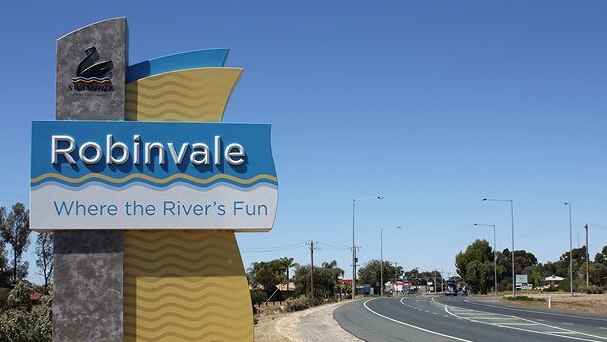 A sign welcoming people to Robinvale reads "Robinvale - where the River's fun", and is marked by the Swan Hill Council logo.