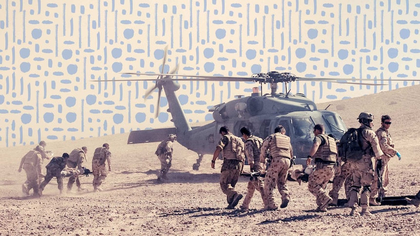 A helicopter lands to collect injured Australian soldiers in the Afghanistan desert.