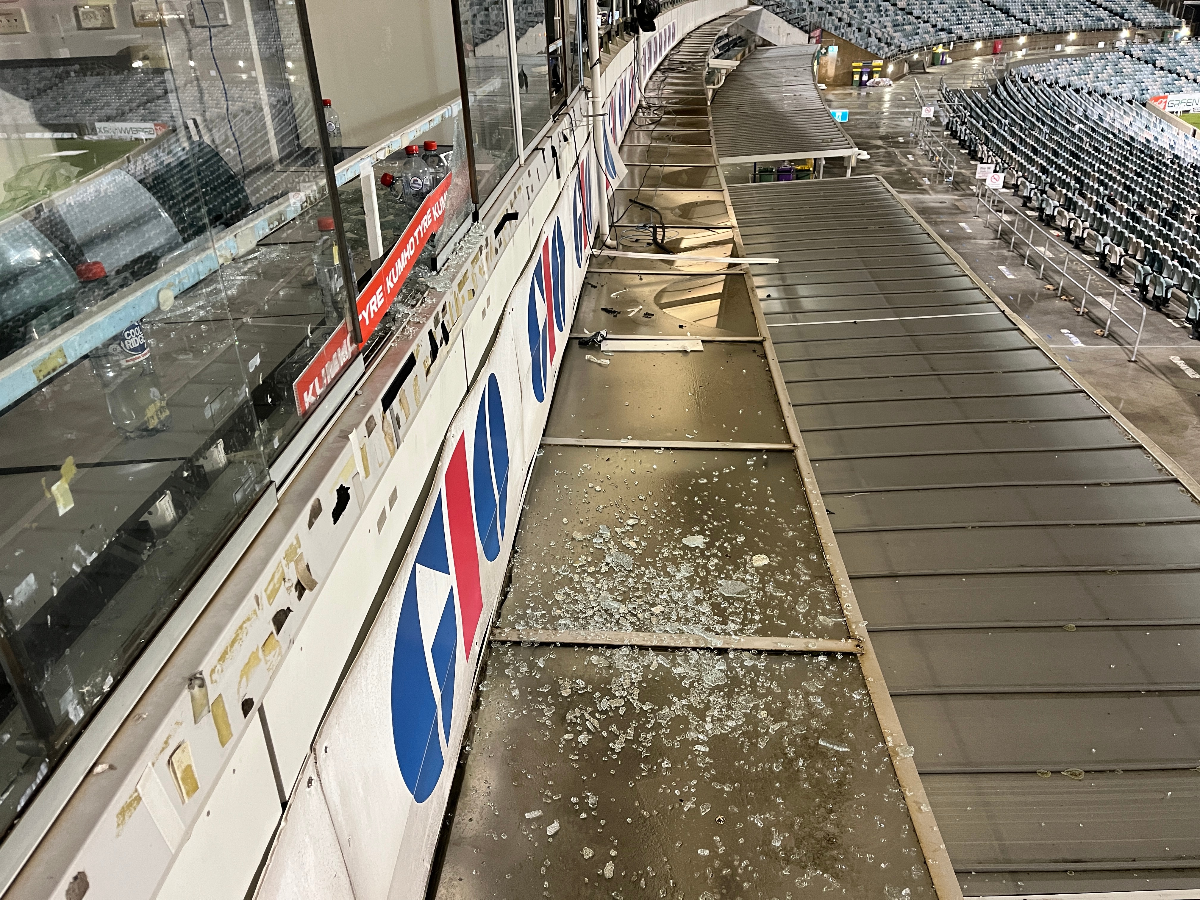 Smashed glass at a football stadium 