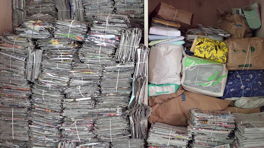 Stacks of newspapers at Kamikatsu recycling plant
