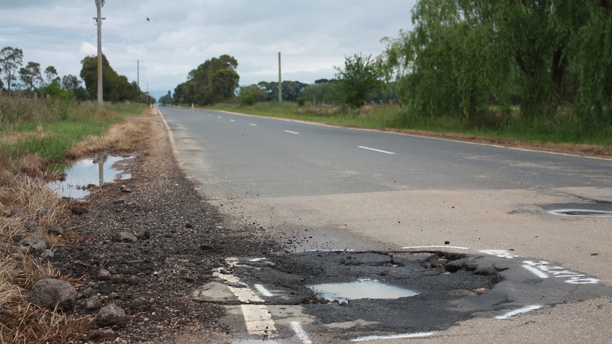 A large pothole on the Sale-Heyfield Road in Gippsland, eastern Victoria.