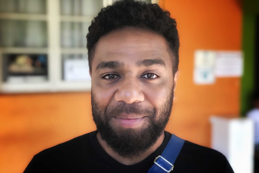 A voter from the indigenous people of New Caledonia is seen.