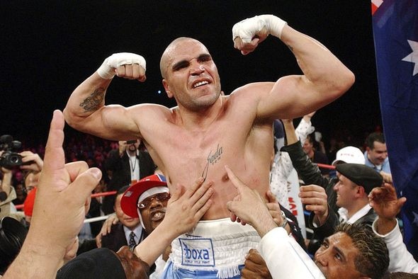 Anthony Mundine celebrates after beating Antwun Echols in their 2003 Boxing match.