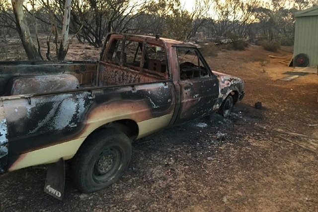 The burnt remains of a ute.