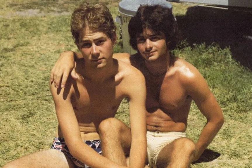 Photo of a young Timothy Conigrave and John Caleo in speedos, with Caleo's arm around Conigrave