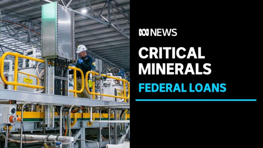 Critical Minerals, Federal Loans: A worker in a white hardhat working in an industrial setting.