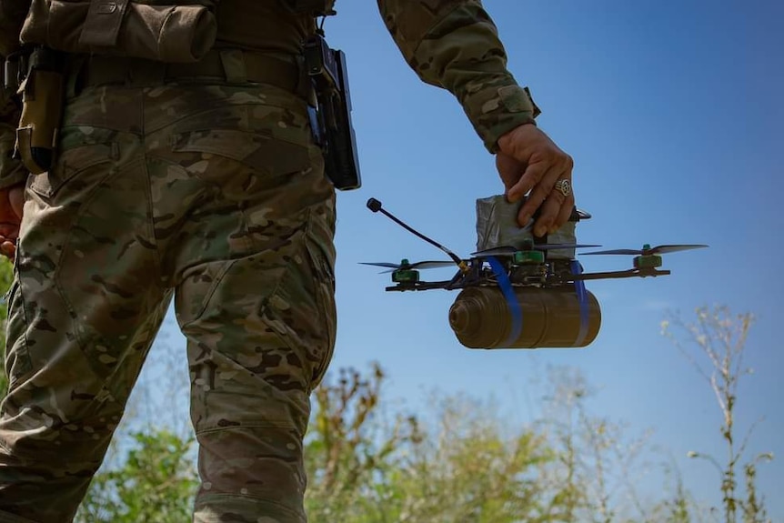 A commercial drone fitted with a mortar round in Ukraine
