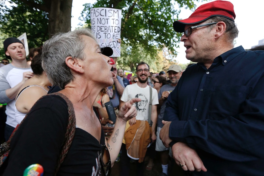 Protesters with opposing views face off at a "Free Speech" rally in Boston.