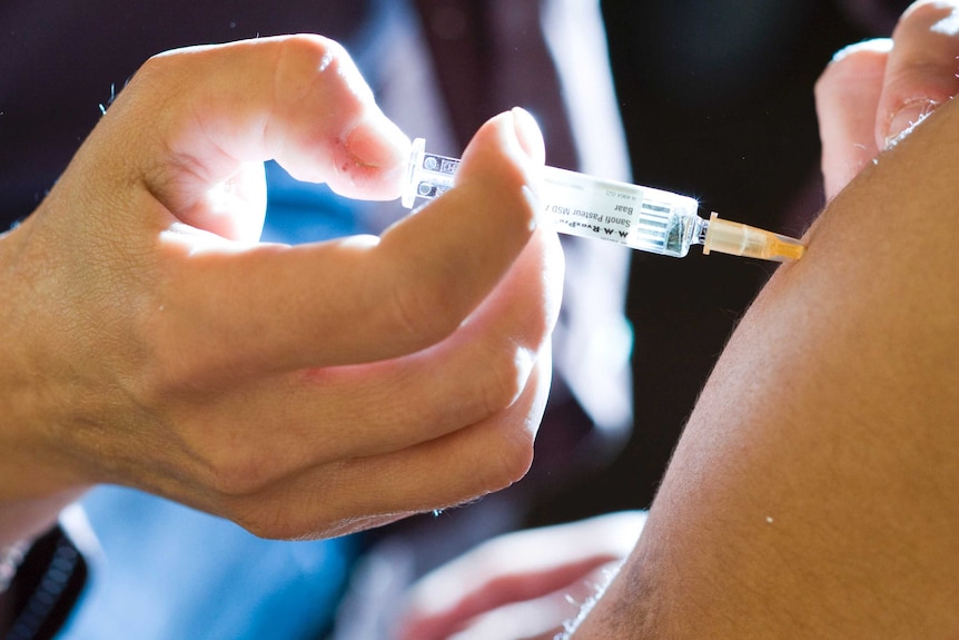 A measles injection being given.