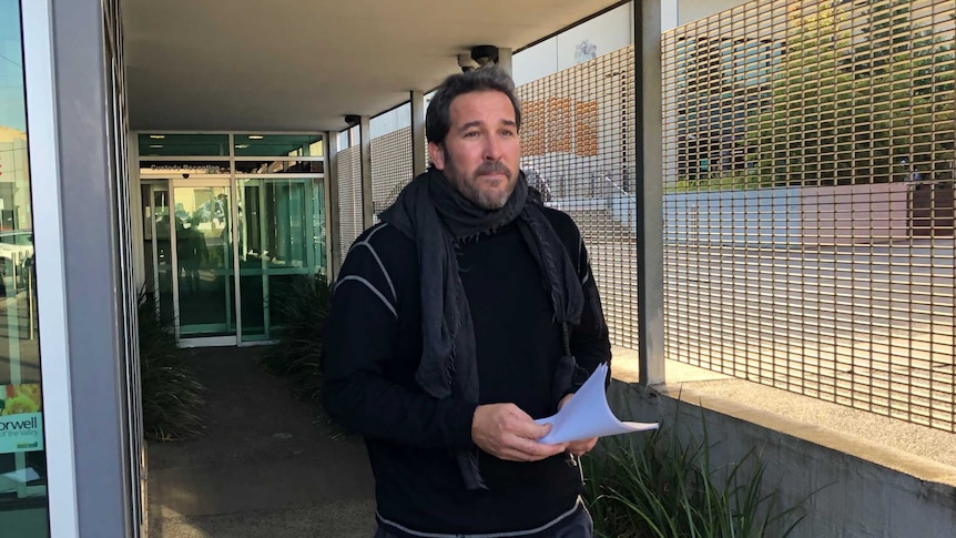 South Gippsland shire councillor Jeremy Rich walking outside Latrobe Valley Magistrates court