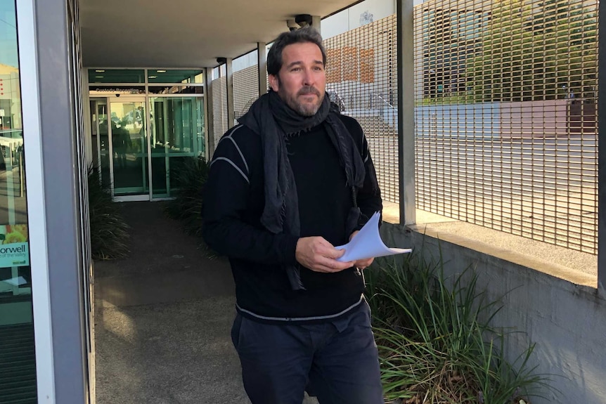 South Gippsland shire councillor Jeremy Rich walking outside Latrobe Valley Magistrates court