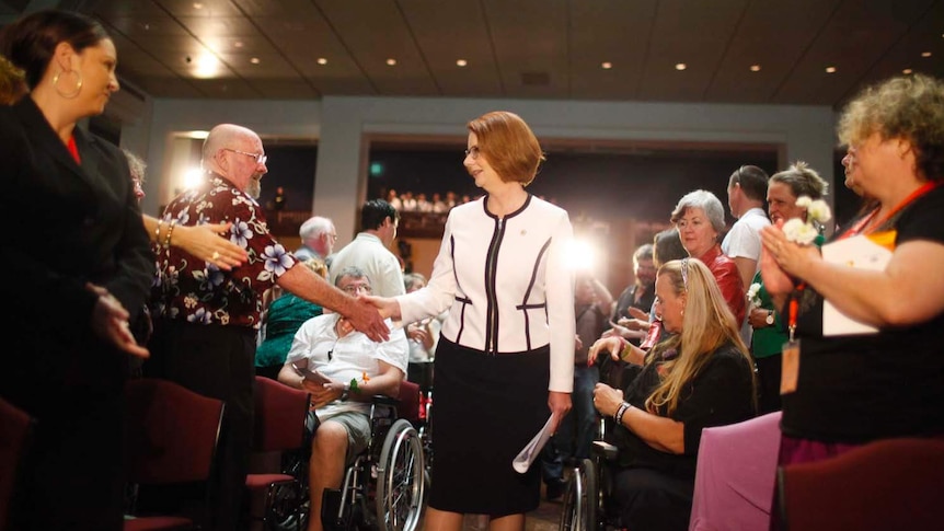Julia Gillard meets people at the national apology for forced adoptions
