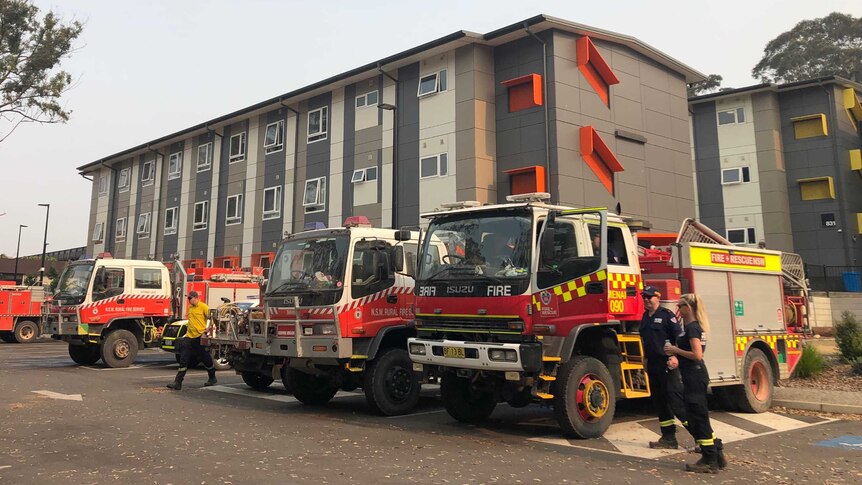 Fire trucks and university accommodation buildings.