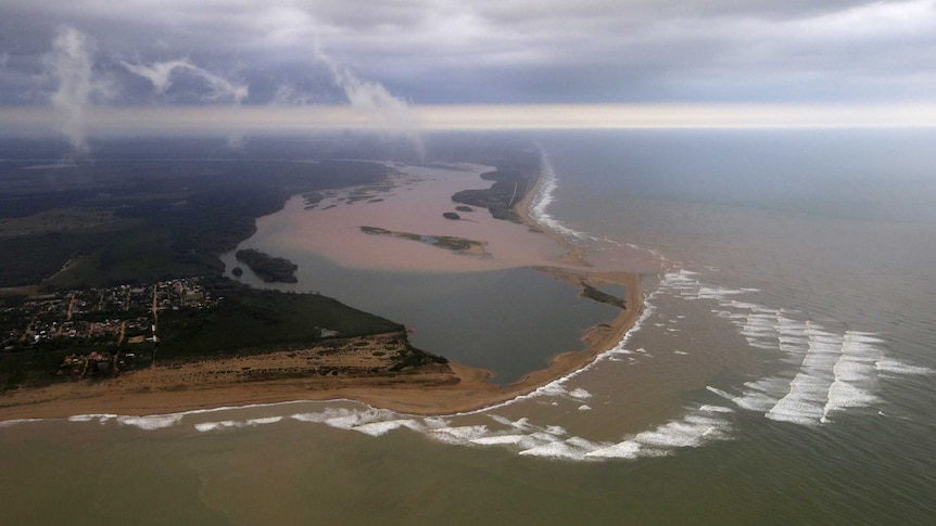 An aerial view of the mouth of Doce River