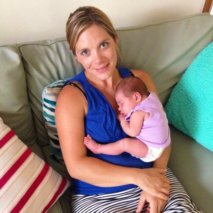 Tara Costigan holding her baby daughter.