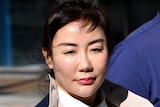 Headshot of Yutian Li arriving at the District Court in Brisbane on July 18, 2019