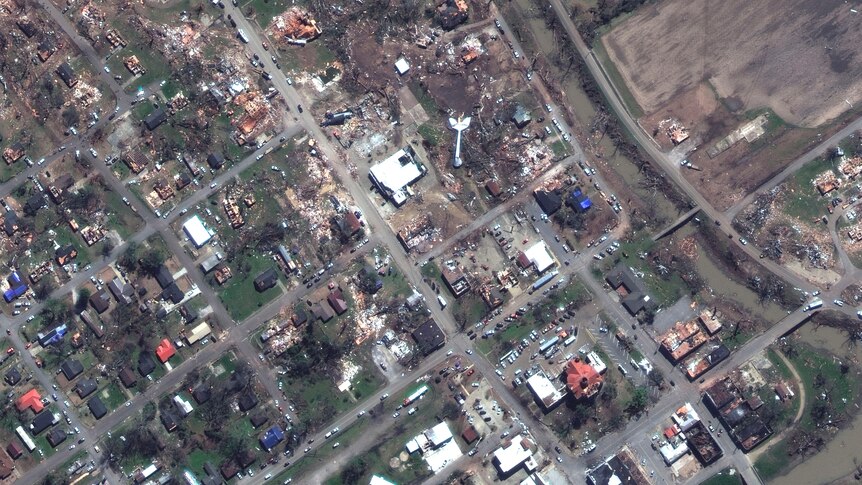 A satellite image of destroyed buildings 