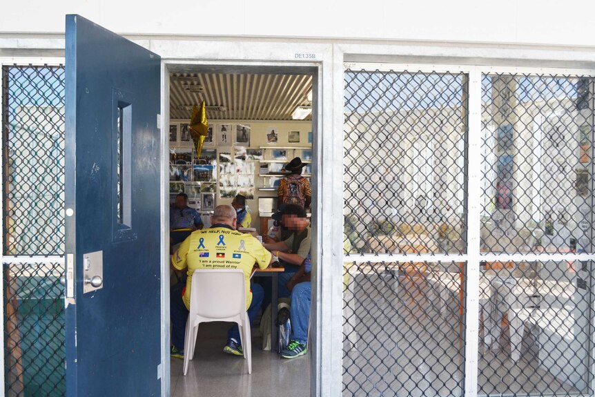 A shot from outside the classroom, as prisoners take part in weekly art classes at Southern Queensland Correctional Centre.