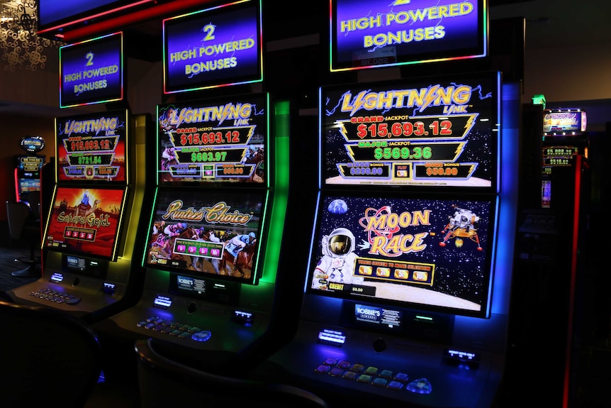 Three poker machines inside Canberra club.