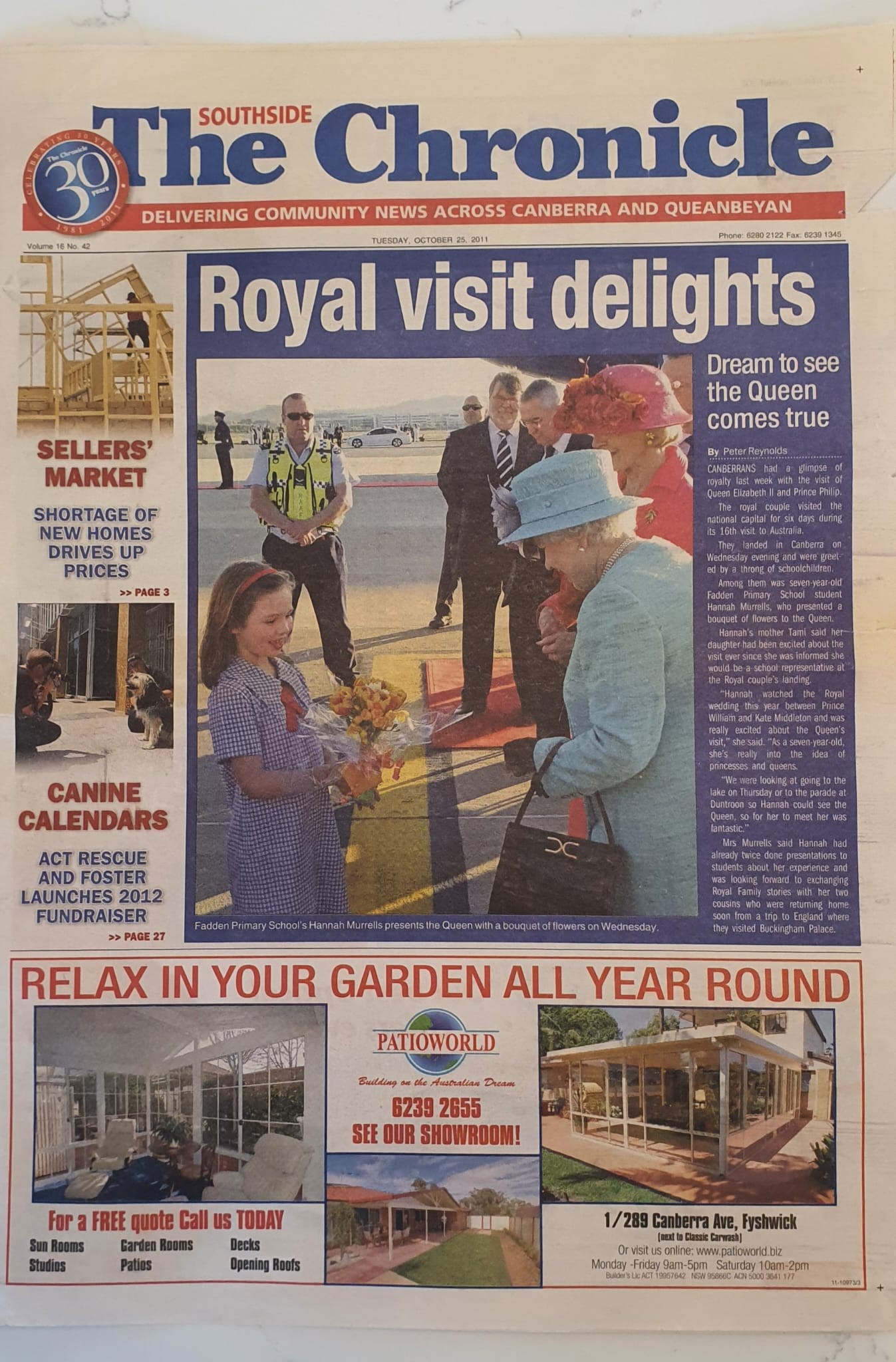 A photo of the front page of The Chronicle newspaper with a photo of Hannah meeting the Queen