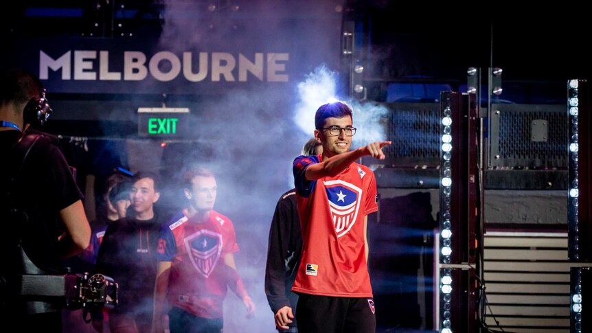Overwatch players from the Washington Justice team walking onto the stage in Rod Laver Arena