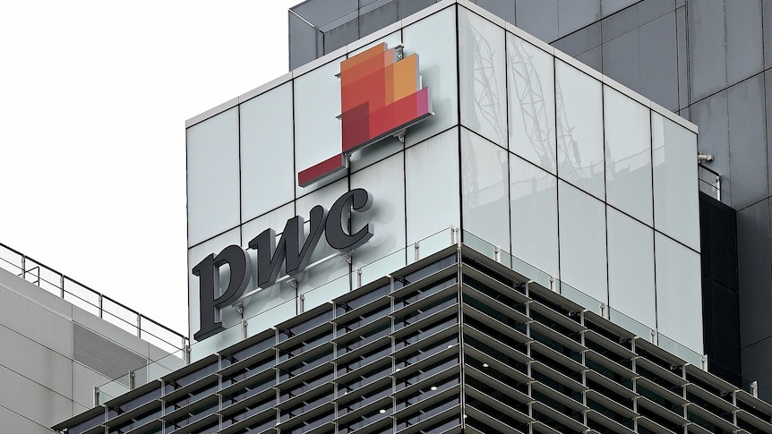 The PwC logo is shown on an office building.