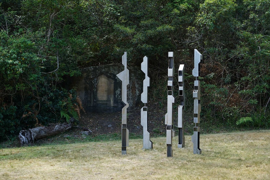 Anthony Battagloa's Without End sculpture featuring five steel geometric polls.