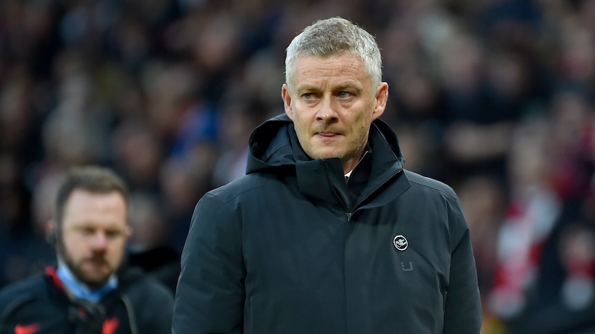 Manchester United manager Ole Gunnar Solskjaer looks tense at halftime during the EPL soccer match against Liverpool.