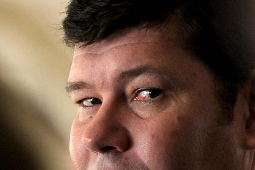 Crown's James Packer looks on at a function